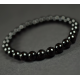 Men's women's healing bracelet made of black polished amber beads