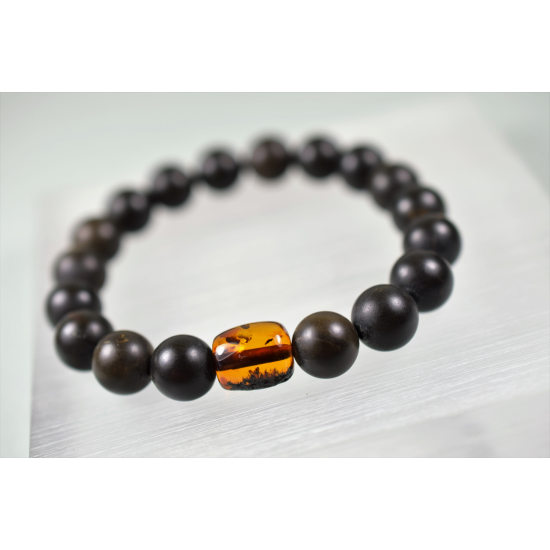 Men's healing bracelet made of black unpolished amber beads