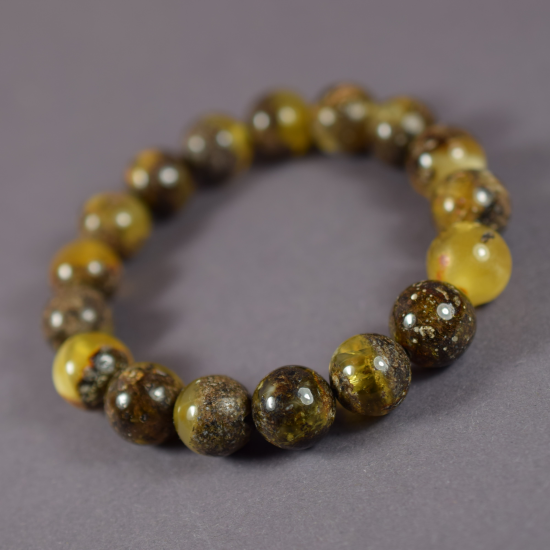 Amber Bracelet in Round Algae Color with a Piece of Amber