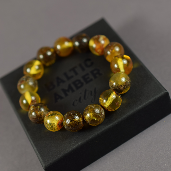 Amber Bracelet in Round Algae Color with a Piece of Amber