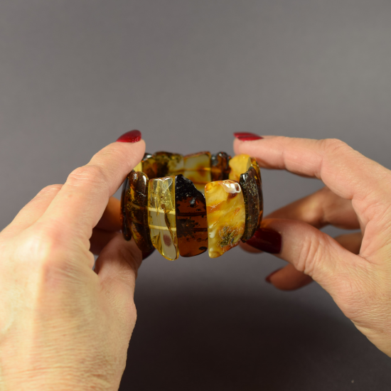 Wide Amber bracelet made of naturally shaped pieces of amber