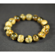 The bracelet is made of polished amber balls marble colored amber beads