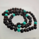 Amber necklace from Black raw amber and green turquoise beads 