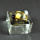 Golden plated Silver ring made of two-tone amber