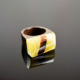 A modernist, Avant Garde, statement ring made of butterscotch Baltic amber