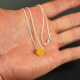 Amber square pendant with sterling silver element and chain