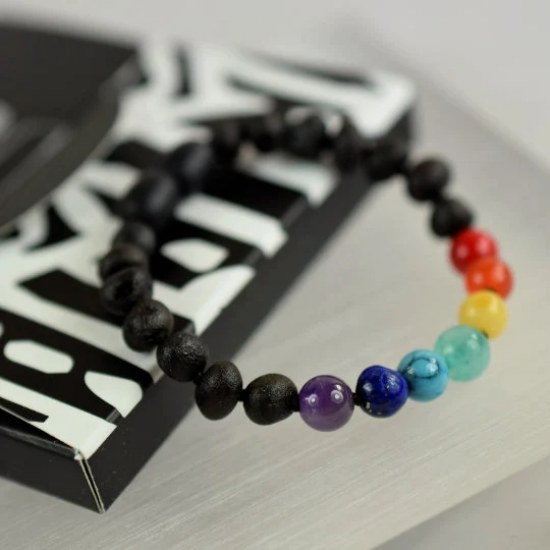 Baby amber bracelet in black raw amber with rainbow colors beads