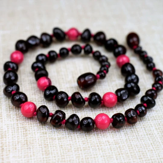 Dark cherry amber baby necklace with pink turquoise beads