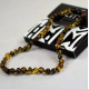 Amber necklace for children with natural amber with seaweed